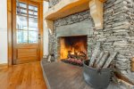 stone fireplace in living room
